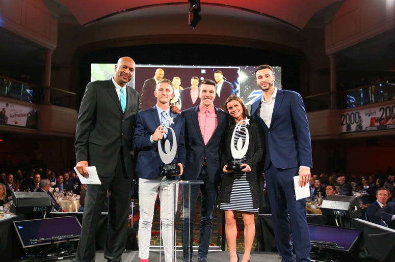 Larry Nance Jr, Larry Nance Sr., and Rachel Bender and the Akron mens soccer team Larry Nance Jr, Larry Nance Sr., and Rachel Bender and the Akron mens soccer team