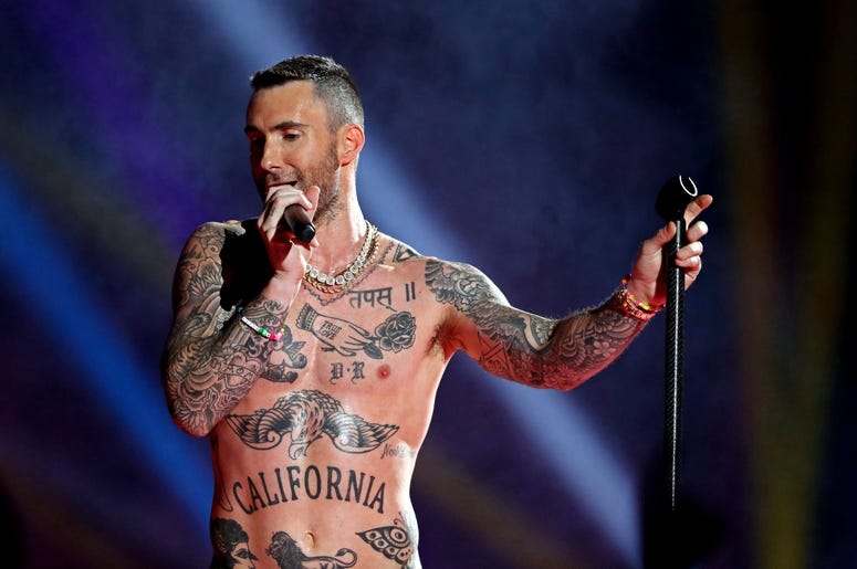 Feb 3, 2019; Atlanta, GA, USA; Maroon 5 lead singer Adam Levine performs during the half show in Super Bowl LIII between the New England Patriots and the Los Angeles Rams at Mercedes-Benz Stadium. Mandatory Credit: Matthew Emmons-USA TODAY Sports Feb 3, 2019; Atlanta, GA, USA; Maroon 5 lead singer Adam Levine performs during the half show in Super Bowl LIII between the New England Patriots and the Los Angeles Rams at Mercedes-Benz Stadium. Mandatory Credit: Matthew Emmons-USA TODAY Sports