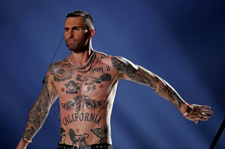 Feb 3, 2019; Atlanta, GA, USA; Maroon 5 lead singer Adam Levine performs during the half show in Super Bowl LIII between the New England Patriots and the Los Angeles Rams at Mercedes-Benz Stadium. Mandatory Credit: Matthew Emmons-USA TODAY Sports Feb 3, 2019; Atlanta, GA, USA; Maroon 5 lead singer Adam Levine performs during the half show in Super Bowl LIII between the New England Patriots and the Los Angeles Rams at Mercedes-Benz Stadium. Mandatory Credit: Matthew Emmons-USA TODAY Sports