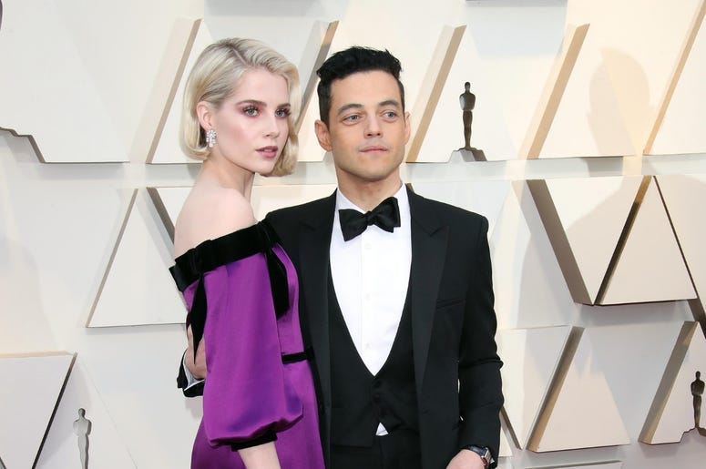 February 24, 2019; Los Angeles, CA, USA; Lucy Boynton, left, and Rami Malek arrive at the 91st Academy Awards at the Dolby Theatre. Mandatory Credit: Dan MacMedan-USA TODAY NETWORK February 24, 2019; Los Angeles, CA, USA; Lucy Boynton, left, and Rami Malek arrive at the 91st Academy Awards at the Dolby Theatre. Mandatory Credit: Dan MacMedan-USA TODAY NETWORK