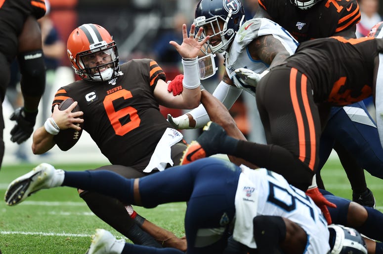 Sep 8, 2019; Cleveland, OH, USA; Cleveland Browns quarterback Baker Mayfield (6) is sacked by Tennessee Titans linebacker Cameron Wake (91) during the second half at FirstEnergy Stadium. Mandatory Credit: Ken Blaze-USA TODAY Sports Sep 8, 2019; Cleveland, OH, USA; Cleveland Browns quarterback Baker Mayfield (6) is sacked by Tennessee Titans linebacker Cameron Wake (91) during the second half at FirstEnergy Stadium. Mandatory Credit: Ken Blaze-USA TODAY Sports