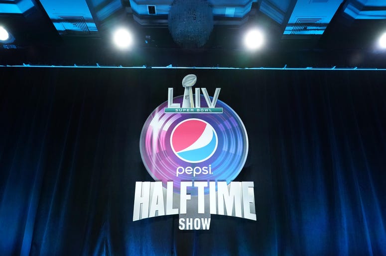 Jan 30, 2020; Miami, Florida, USA; Recording artists Shakira (left) and Jennifer Lopez (right) during the Super Bowl LIV halftime talent show press conference at Hilton Downtown. Mandatory Credit: Kirby Lee-USA TODAY Sports