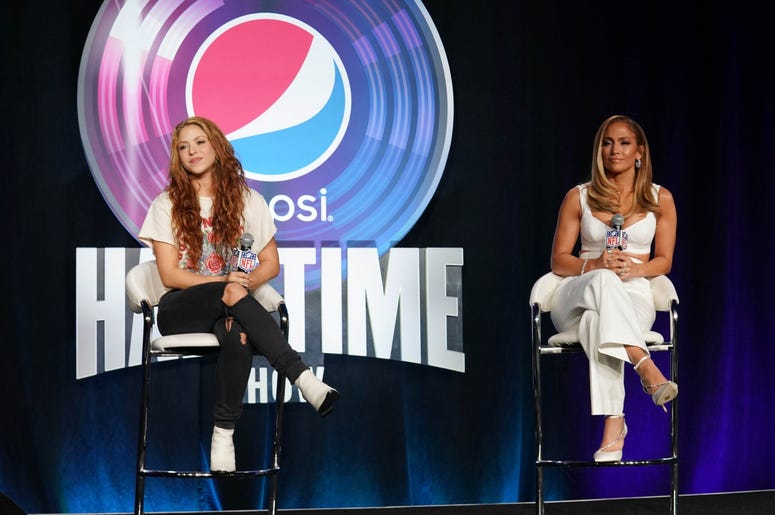 Jan 30, 2020; Miami, Florida, USA; Recording artists Shakira (left) and Jennifer Lopez (right) during the Super Bowl LIV halftime talent show press conference at Hilton Downtown. Mandatory Credit: Kirby Lee-USA TODAY Sports