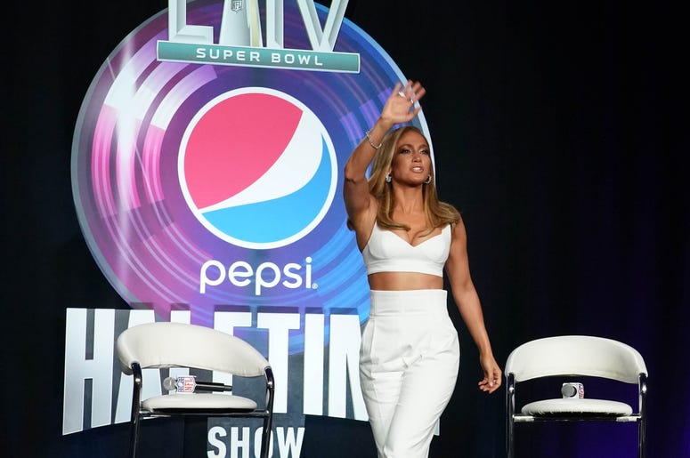 Jan 30, 2020; Miami, Florida, USA; Recording aritsts Shakira (left) and Jennifer Lopez (right) during the Super Bowl LIV halftime talent show press conference at the Hilton Downtown Miami. Mandatory Credit: Steve Mitchell-USA TODAY Sports