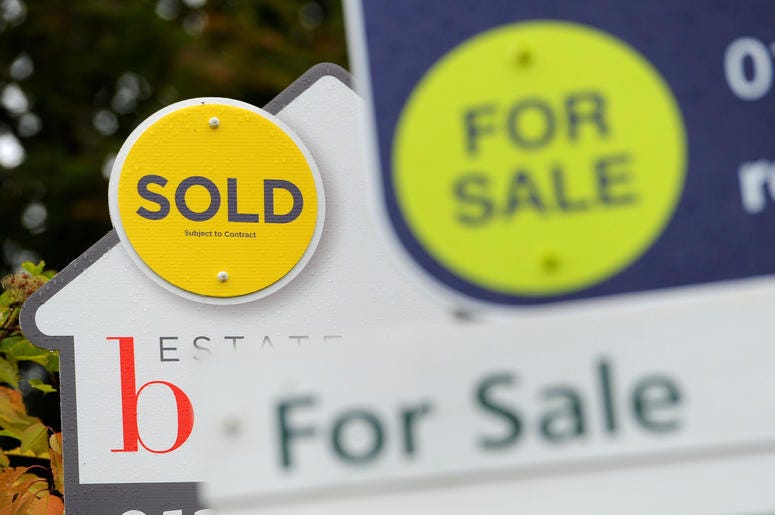 Home for sale sign