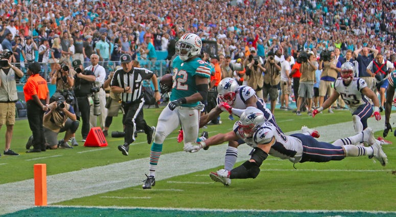 Kenyan Drake crossing goal line Miami Miracle