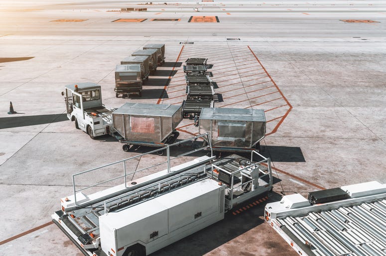 Airport Carts On Tarmac airport carts on tarmac