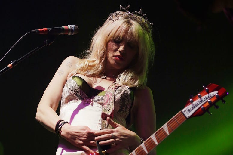 Courtney Love performs in 2014 Courtney Love performs in 2014