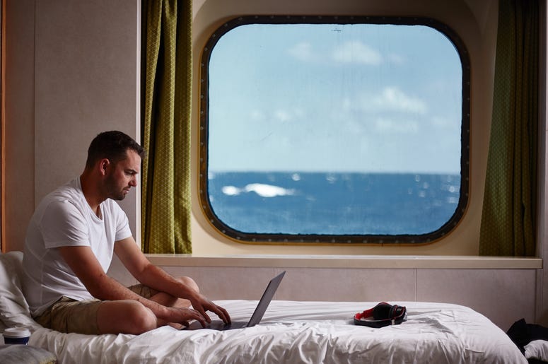 Guy On Laptop On Cruise Ship