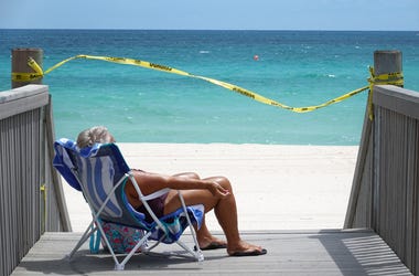 Woman On Quarantine Beach