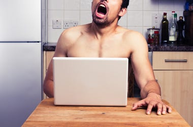 Guy Watching Porn In Kitchen guy watching adult content in kitchen on computer