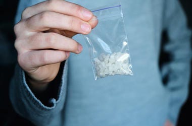 Man Holding Meth