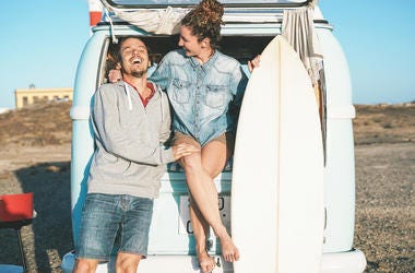 Surfing Couple Laughs