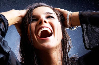 Woman Enjoying Rain