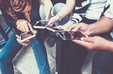 Cell Phones In Hand