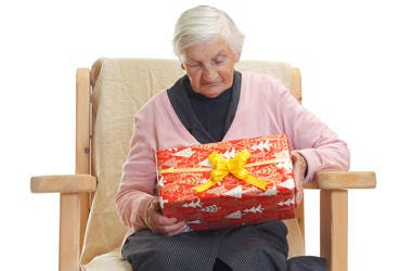 Grandma With Christmas Gift grandma with christmas gift