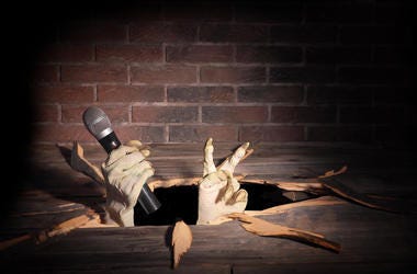 Monster Hands With Microphone monster hands in floor holding microphone
