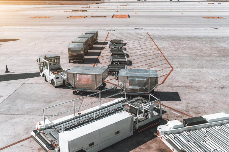 Airport Carts On Tarmac airport carts on tarmac