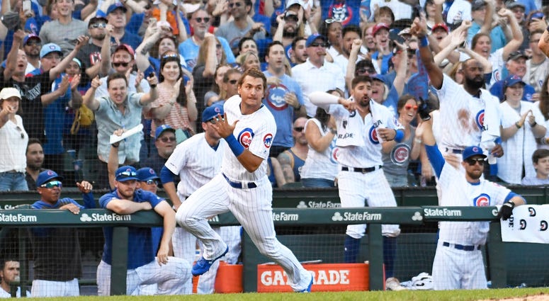 Cubs outfielder Albert Almora Jr. rounds third base as he scores a run. Cubs outfielder Albert Almora Jr. rounds third base as he scores a run.