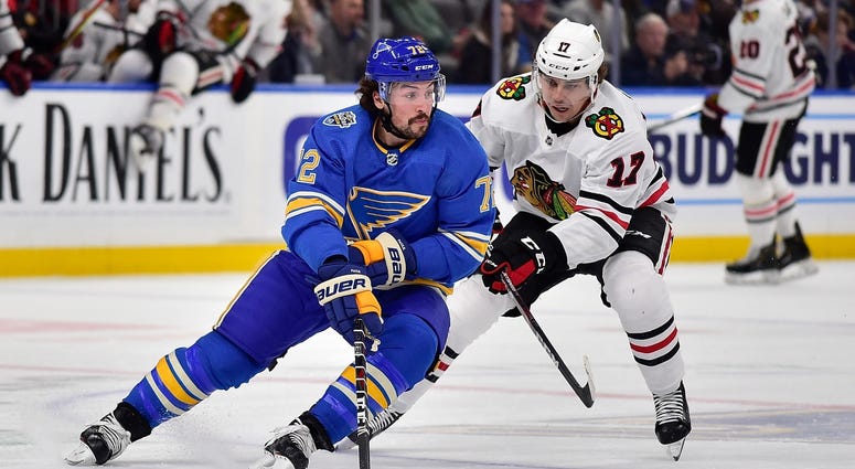 Blues defenseman Justin Faulk (72) handles the puck as Blackhawks center Dylan Strome (17) defends. Blues defenseman Justin Faulk (72) handles the puck as Blackhawks center Dylan Strome (17) defends.