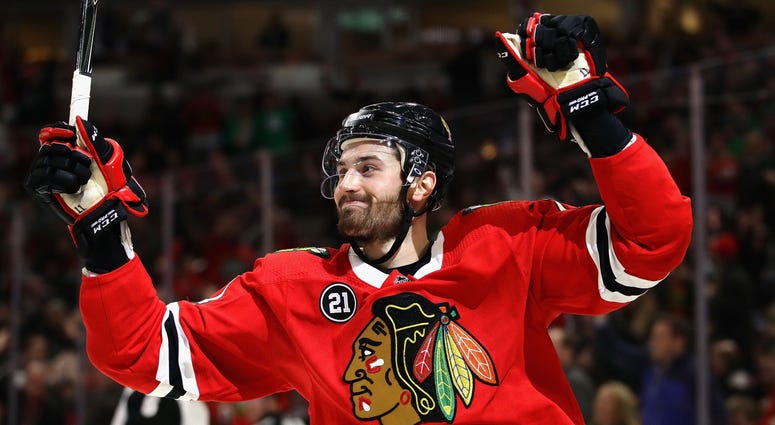 Blackhawks forward Brendan Perlini celebrates after scoring a goal in a win against the Coyotes. Blackhawks forward Brendan Perlini celebrates after scoring a goal in a win against the Coyotes.