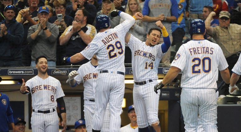 Brewers first baseman Tyler Austin (29) celebrates with third baseman Hernan Perez (14) after hitting a three-run homer against the Cubs. Brewers first baseman Tyler Austin (29) celebrates with third baseman Hernan Perez (14) after hitting a three-run homer against the Cubs.