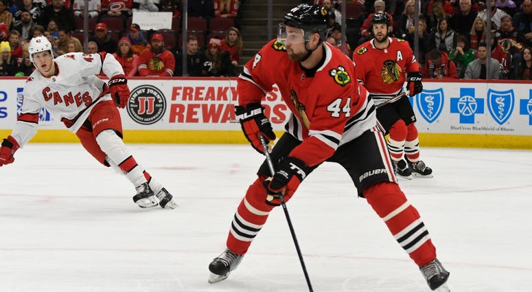 Blackhawks defenseman Calvin de Haan looks to move the puck. Blackhawks defenseman Calvin de Haan looks to move the puck.
