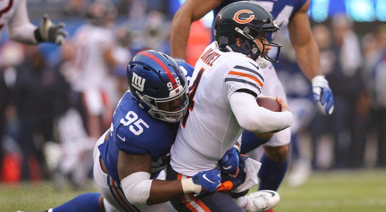 Bears quarterback Chase Daniel (4) is sacked by Giants defensive tackle B.J. Hill (95). Bears quarterback Chase Daniel (4) is sacked by Giants defensive tackle B.J. Hill (95).