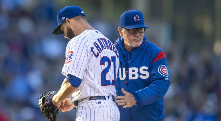 Cubs right-hander Tyler Chatwood is removed by manager Joe Maddon. Cubs right-hander Tyler Chatwood is removed by manager Joe Maddon.