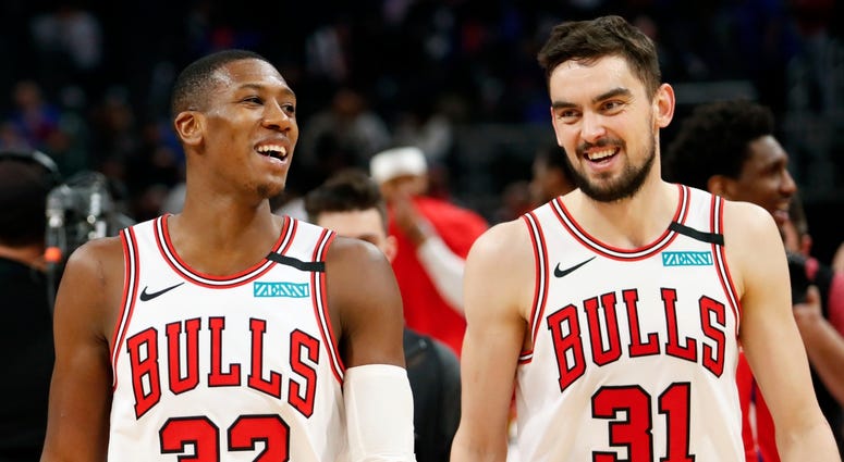 Bulls guard Kris Dunn (32) shares a laugh with guard Tomas Satoransky (31).after a win against the Pistons. Bulls guard Kris Dunn (32) shares a laugh with guard Tomas Satoransky (31).after a win against the Pistons.