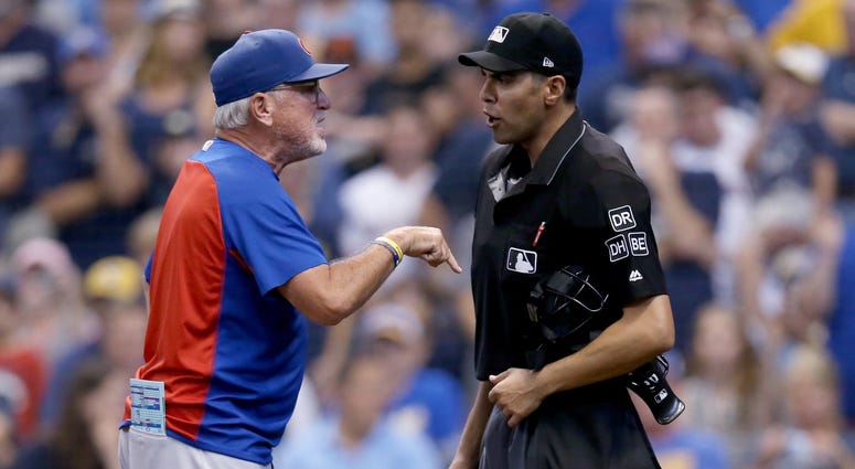 Cubs manager Joe Maddon argues with umpire David Rackley after being ejected. Cubs manager Joe Maddon argues with umpire David Rackley after being ejected.