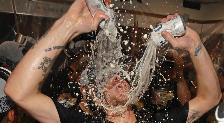 Brewers reliever Josh Hader celebrates after his team beat the Cubs to win the NL Central. Brewers reliever Josh Hader celebrates after his team beat the Cubs to win the NL Central.