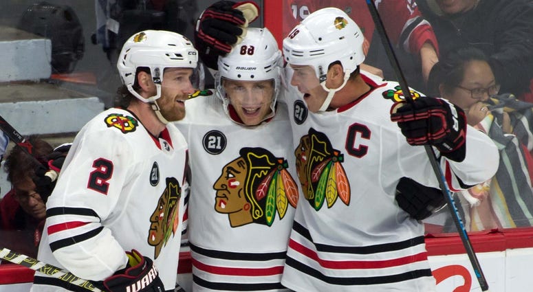 From left, Duncan Keith, Patrick Kane and Jonathan Toews celebrate Kane's goal that lifted the Blackhawks to a win. From left, Duncan Keith, Patrick Kane and Jonathan Toews celebrate Kane's goal that lifted the Blackhawks to a win.