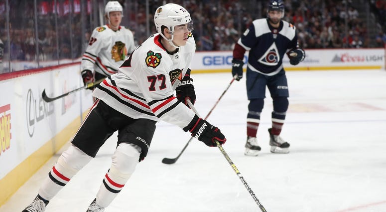 Blackhawks forward Kirby Dach handles the puck against the Avalanche. Blackhawks forward Kirby Dach handles the puck against the Avalanche.