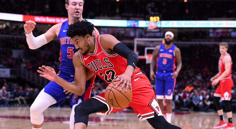Bulls forward Otto Porter Jr. (22) dribbles the ball against Pistons guard Luke Kennard (5). Bulls forward Otto Porter Jr. (22) dribbles the ball against Pistons guard Luke Kennard (5).