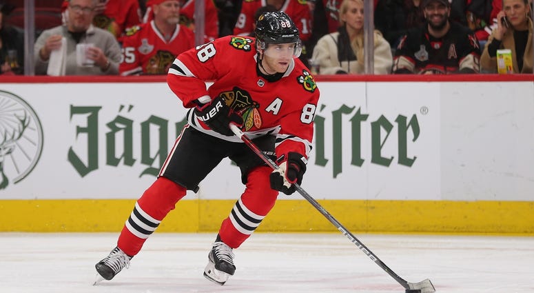 Blackhawks right wing Patrick Kane (88) skates with the puck against the Avalanche. Blackhawks right wing Patrick Kane (88) skates with the puck against the Avalanche.