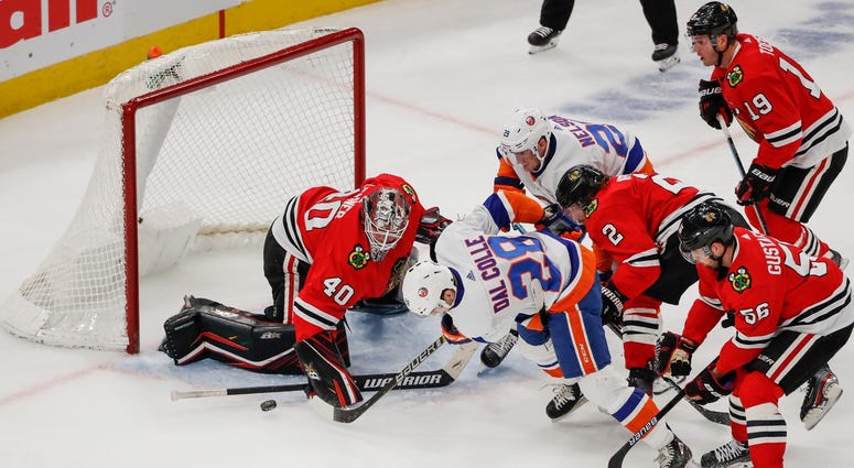 Islanders left wing Michael Dal Colle (28) tries to score against Blackhawks goaltender Robin Lehner (40). Islanders left wing Michael Dal Colle (28) tries to score against Blackhawks goaltender Robin Lehner (40).