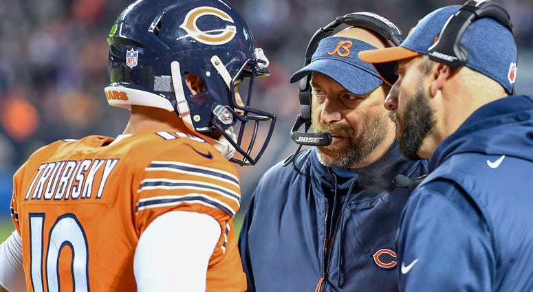 Bears coach Matt Nagy, center, talks with quarterback Mitchell Trubisky (10). Bears coach Matt Nagy, center, talks with quarterback Mitchell Trubisky (10).