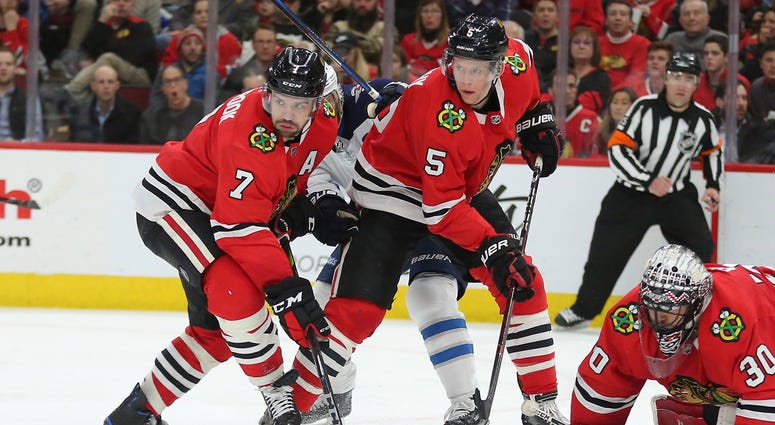 Blackhawks defensemen Brent Seabrook, left, and Connor Murphy Blackhawks defensemen Brent Seabrook, left, and Connor Murphy