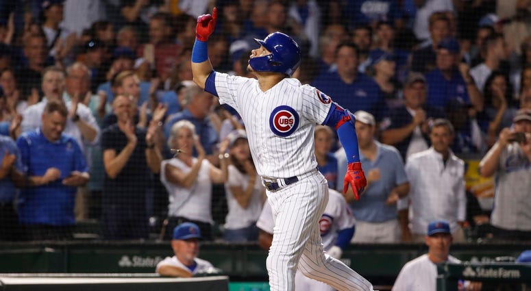 Cubs catcher Willson Contreras rounds the bases after homering. Cubs catcher Willson Contreras rounds the bases after homering.