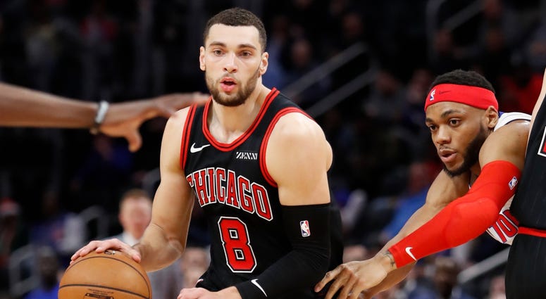 Bulls guard Zach LaVine (8) dribbles the ball against Pistons guard Bruce Brown (6). Bulls guard Zach LaVine (8) dribbles the ball against Pistons guard Bruce Brown (6).