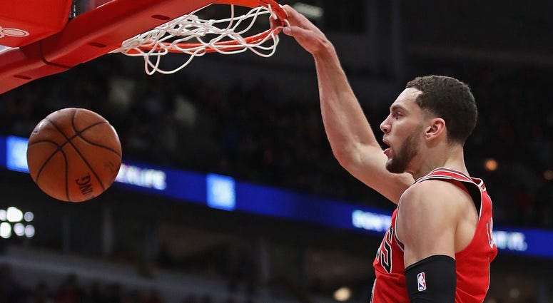Bulls guard Zach LaVine dunks against the Wizards. Bulls guard Zach LaVine dunks against the Wizards.