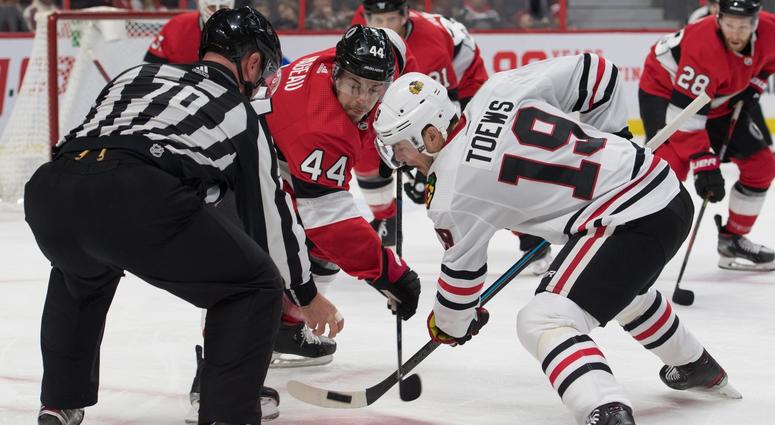 Senators center Jean-Gabriel Pageau (44) faces off against Blackhawks center Jonathan Toews (19). Senators center Jean-Gabriel Pageau (44) faces off against Blackhawks center Jonathan Toews (19).