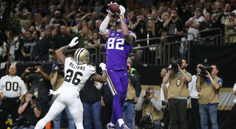 Vikings tight end Kyle Rudolph (82) catches a pass for the winning touchdown over Saints cornerback P.J. Williams (26) in overtime of a wild-card round matchup. Vikings tight end Kyle Rudolph (82) catches a pass for the winning touchdown over Saints cornerback P.J. Williams (26) in overtime of a wild-card round matchup.