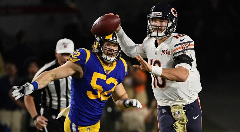 Bears quarterback Mitchell Trubisky (10) throws a pass as he's chased by Rams outside linebacker Clay Matthews. Bears quarterback Mitchell Trubisky (10) throws a pass as he's chased by Rams outside linebacker Clay Matthews.