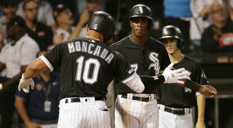 White Sox third baseman Yoan Moncada, left, and shortstop Tim Anderson White Sox third baseman Yoan Moncada, left, and shortstop Tim Anderson