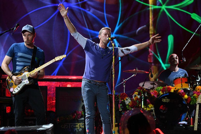 Chris Martin of Coldplay performs at the Hard Rock Stadium Chris Martin of Coldplay performs at the Hard Rock Stadium