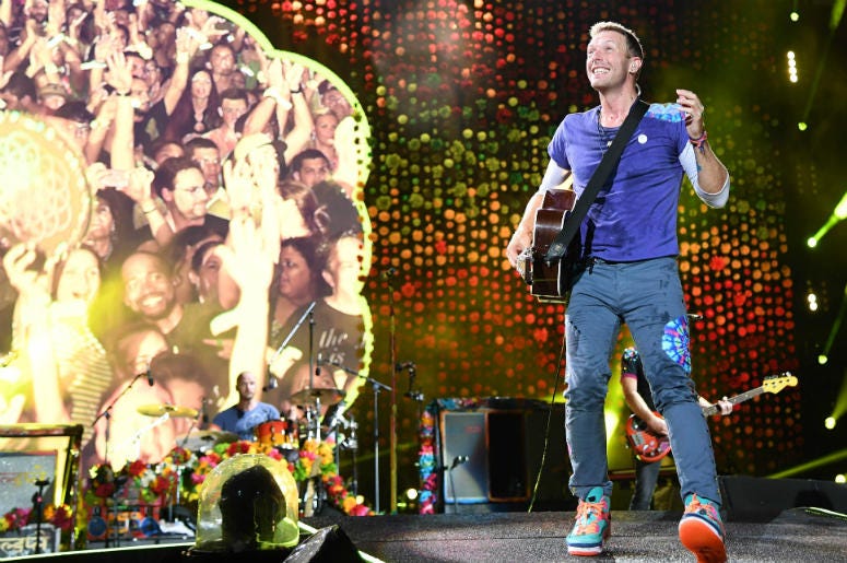 Chris Martin of Coldplay performs at the Hard Rock Stadium. Chris Martin of Coldplay performs at the Hard Rock Stadium.