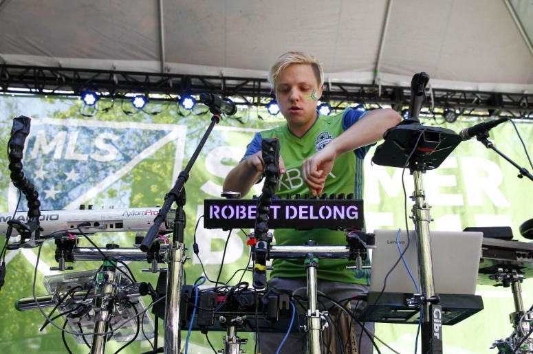 Robert DeLong performs at MLS Summer Beat before the start of a match between the Seattle Sounders FC and the Portland Timbers at CenturyLink Field. Robert DeLong performs at MLS Summer Beat before the start of a match between the Seattle Sounders FC and the Portland Timbers at CenturyLink Field.