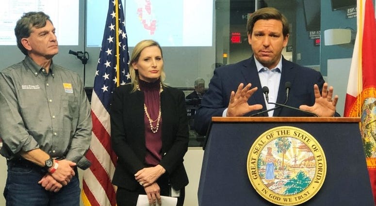 Florida Gov. Ron DeSantis speaks to reporters at the state emergency operations center in Tallahassee, Fla., Saturday, March 14, 2020. The governor on Saturday banned most visits to nursing homes statewide.